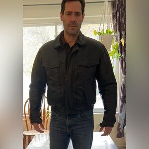 Firstgear motorcycle leather jacket.  Fully lined, hidden compartments, armored